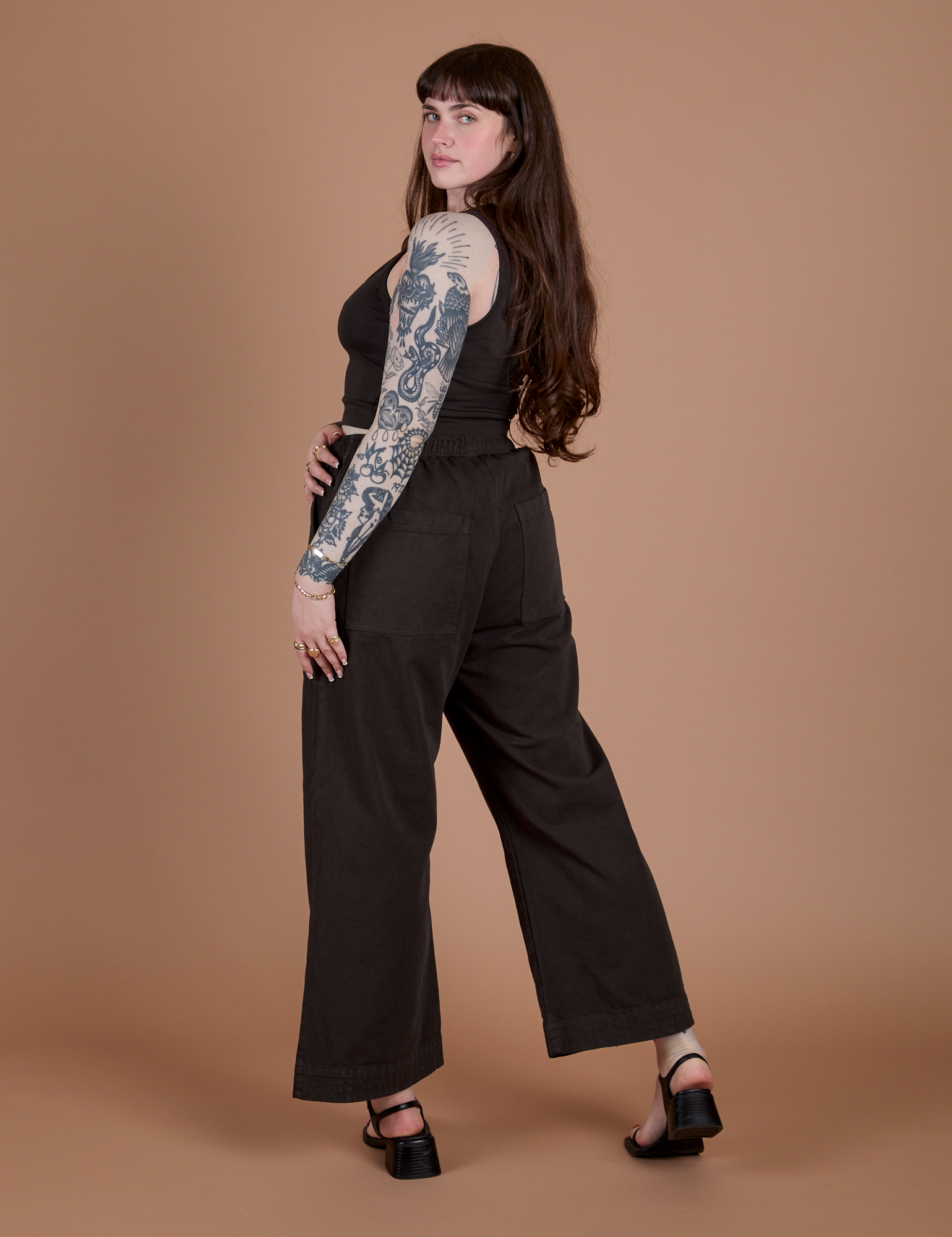 Action Pants in Espresso Brown angled back view on Sydney