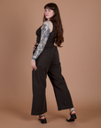 Action Pants in Espresso Brown angled back view on Sydney