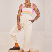 Jesse is 5'8" and wearing XXS Rainbow Overalls