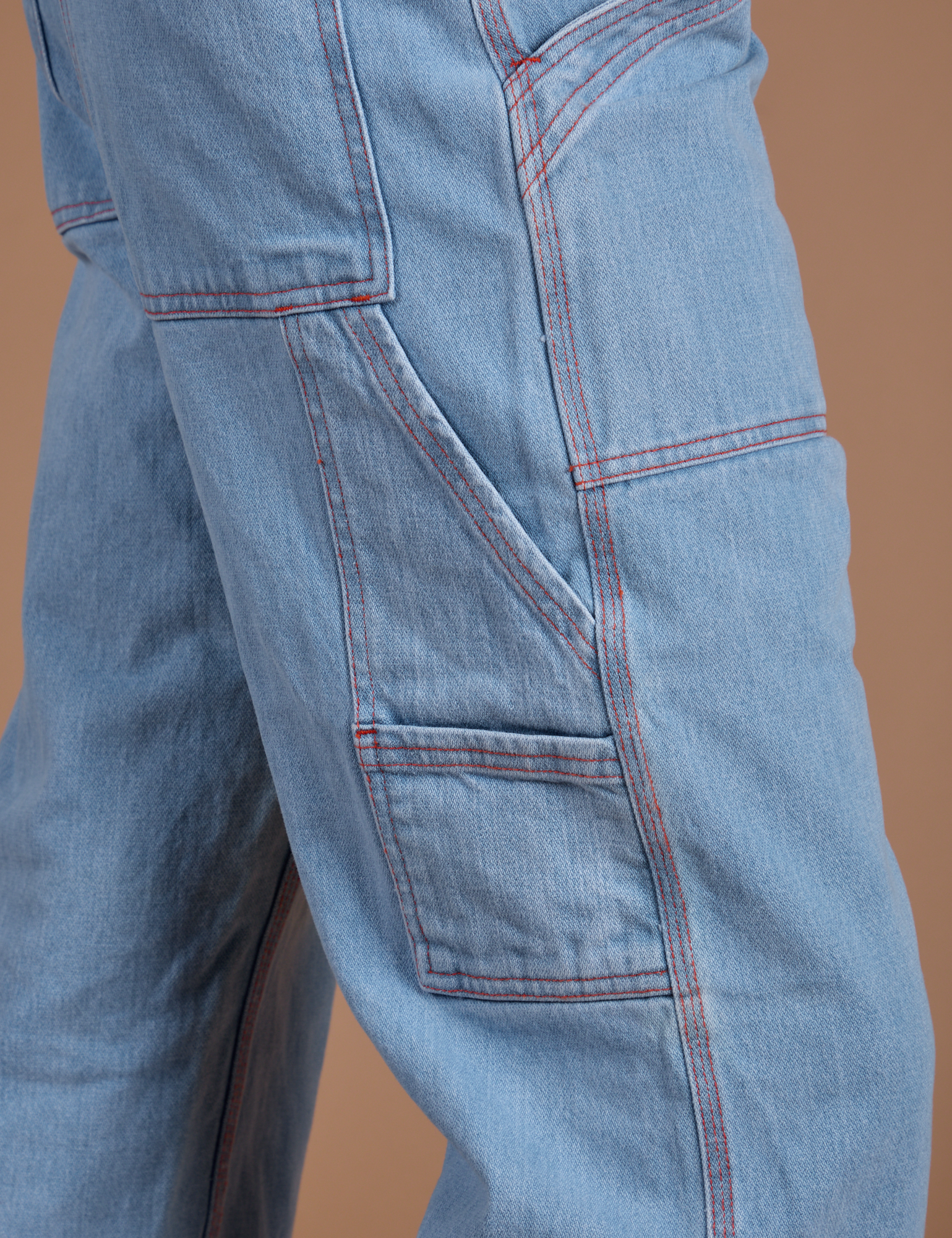 Carpenter Jeans in Light Wash pant leg side view close up