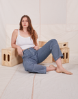 Allison is wearing Carpenter Jeans in Railroad Stripes and vintage off-white Cami