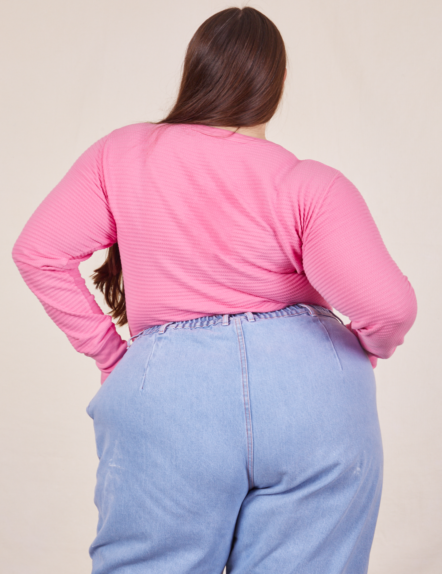 Back view of Honeycomb Thermal in Bubblegum Pink worn by Marielena