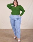 Marielena is wearing Honeycomb Thermal in Lawn Green and light wash Denim Trousers
