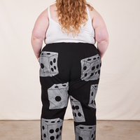 Back view of Icon Work Pants in Dice and vintage off-white Cropped Cami worn by Catie