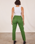 Back view of Pencil Pants in Lawn Green and vintage off-white Cropped Tank Top on Tiara