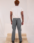 Back view of Mid-Rise Work Pants in Slate Grey and Organic Vintage Tee in vintage tee off-white on Issac