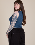 Angled back view of Muscle Tee in French Blue on Sydney