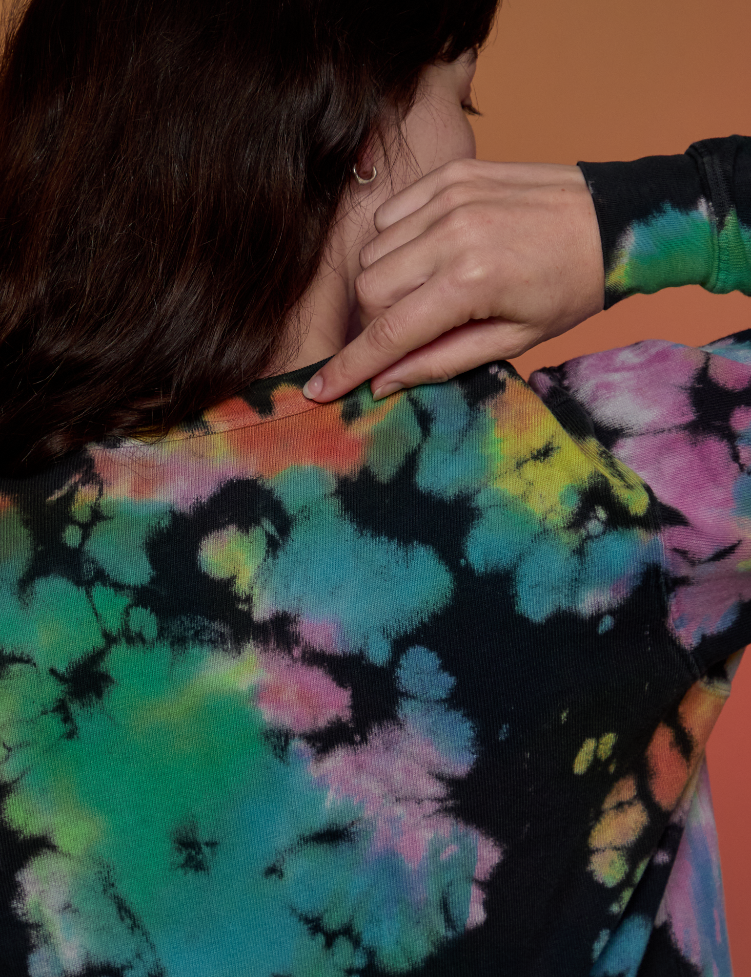 Magic Waters Long Sleeve Burly Tee in Rainbow back shoulder close up on Alex