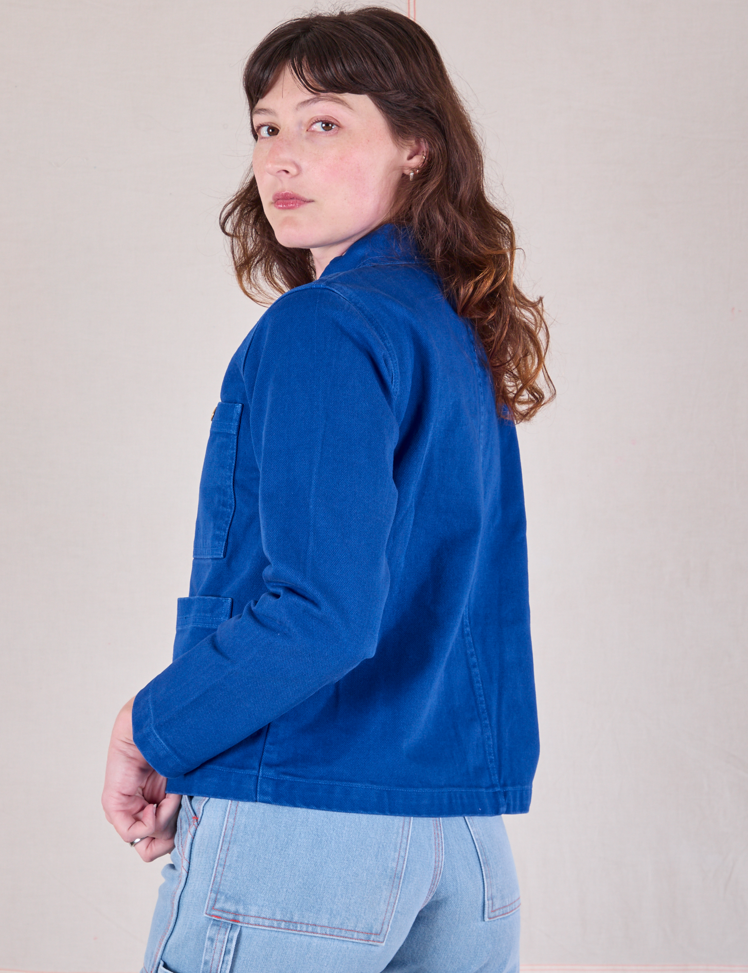 Denim Work Jacket in Royal Blue side view on Alex