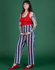 Angled front view of  Work Pants in Pacific Stripe and mustang red Cropped Tank on Sydney
