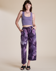 Alex is wearing Magic Waters Drop Pocket Pants in Dark Lavender and faded grape Cropped Tank