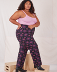 Side view of Western Pants in Purple Tile Jacquard and bubblegum pink Cami on Morgan