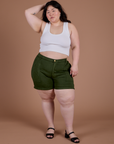 Ashley is wearing Classic Work Shorts in Evergreen and Cropped Tank in Vintage Tee White
