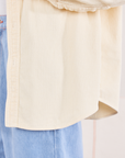 Corduroy Overshirt in Vintage Off-White hem close up on Jesse