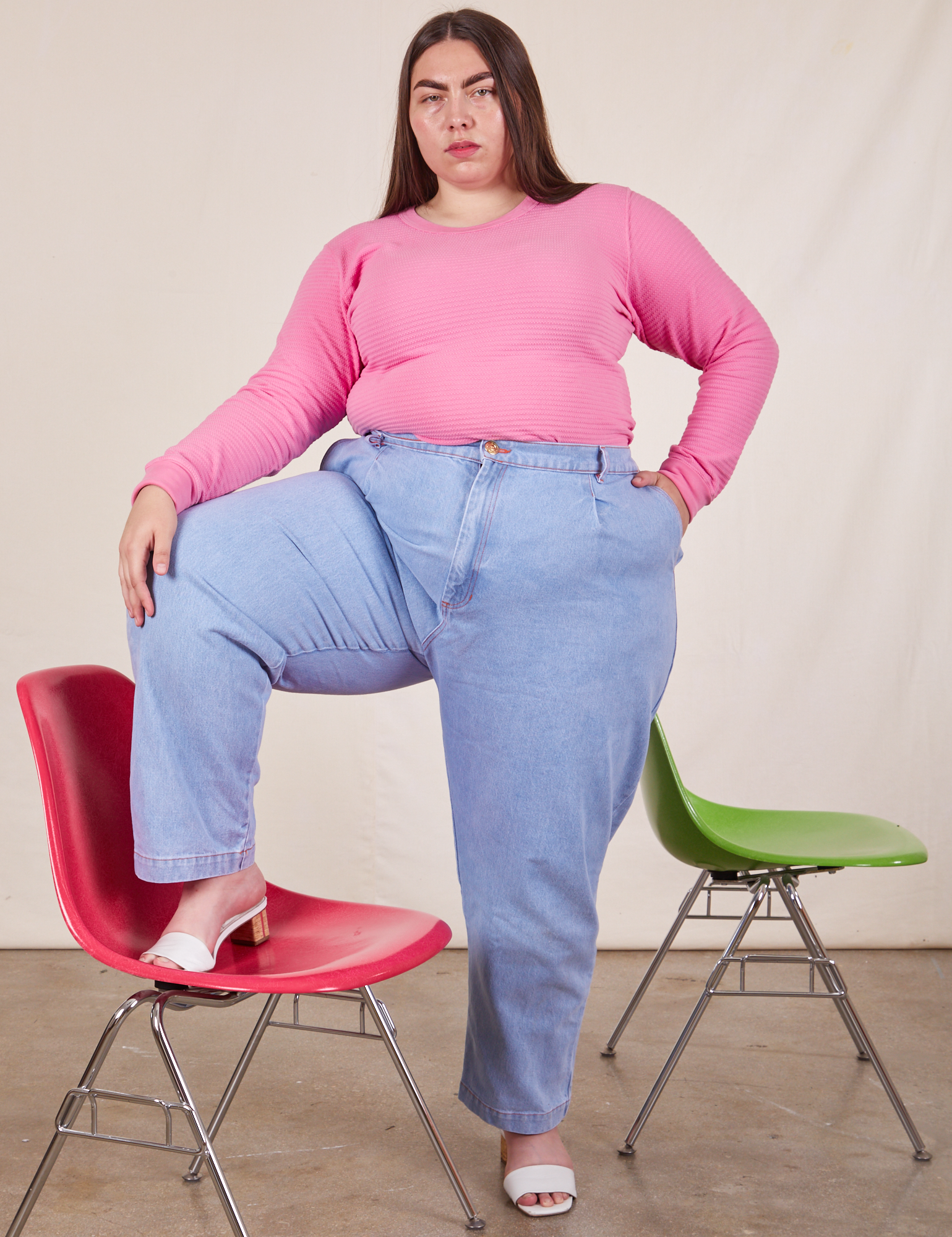 Marielena is wearing Honeycomb Thermal in Bubblegum Pink and light wash Denim Trousers