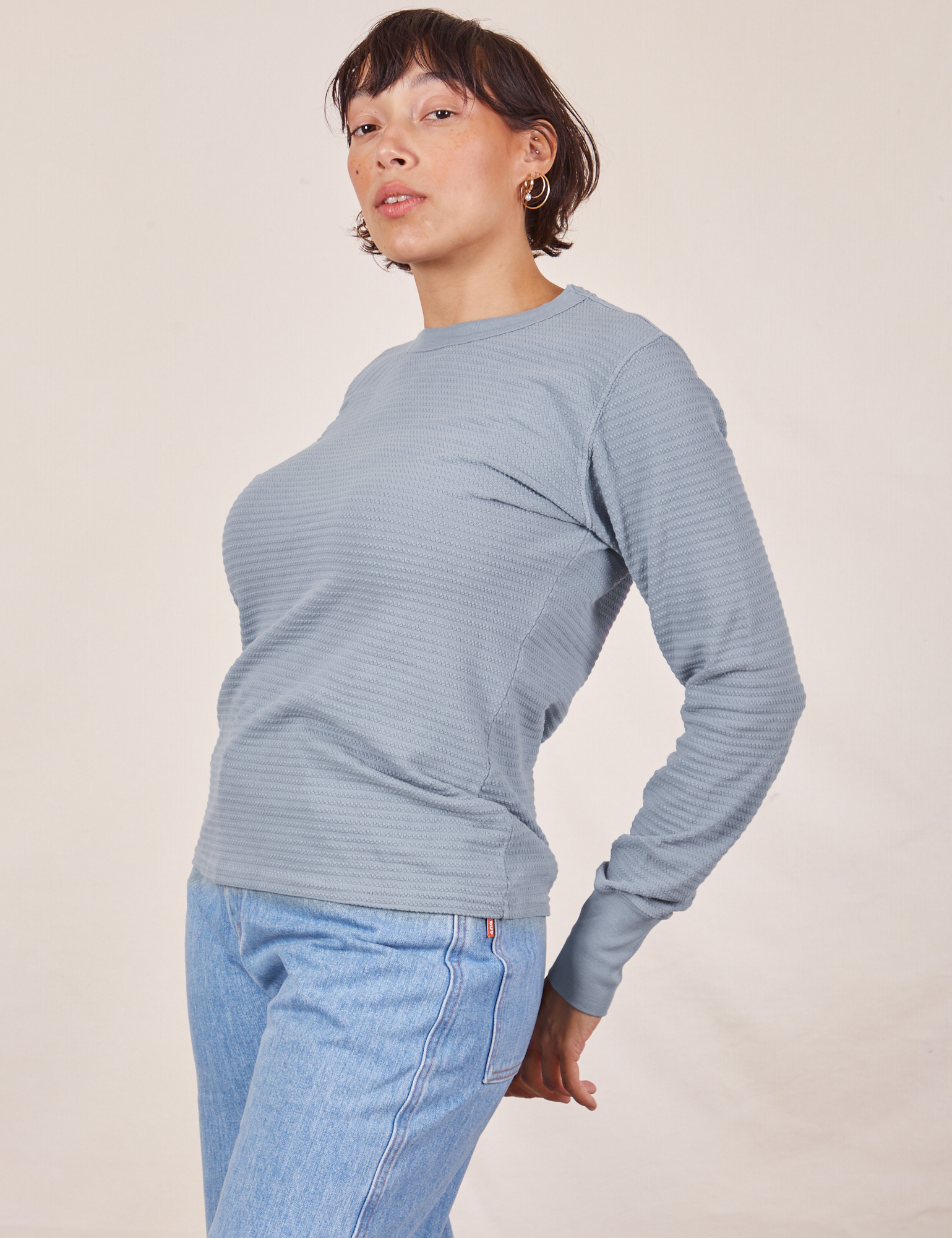 Angled view of Honeycomb Thermal in Periwinkle worn by Tiara