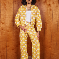 Jesse is wearing Jacquard Ricky Jacket in Yellow and matching Western Pants