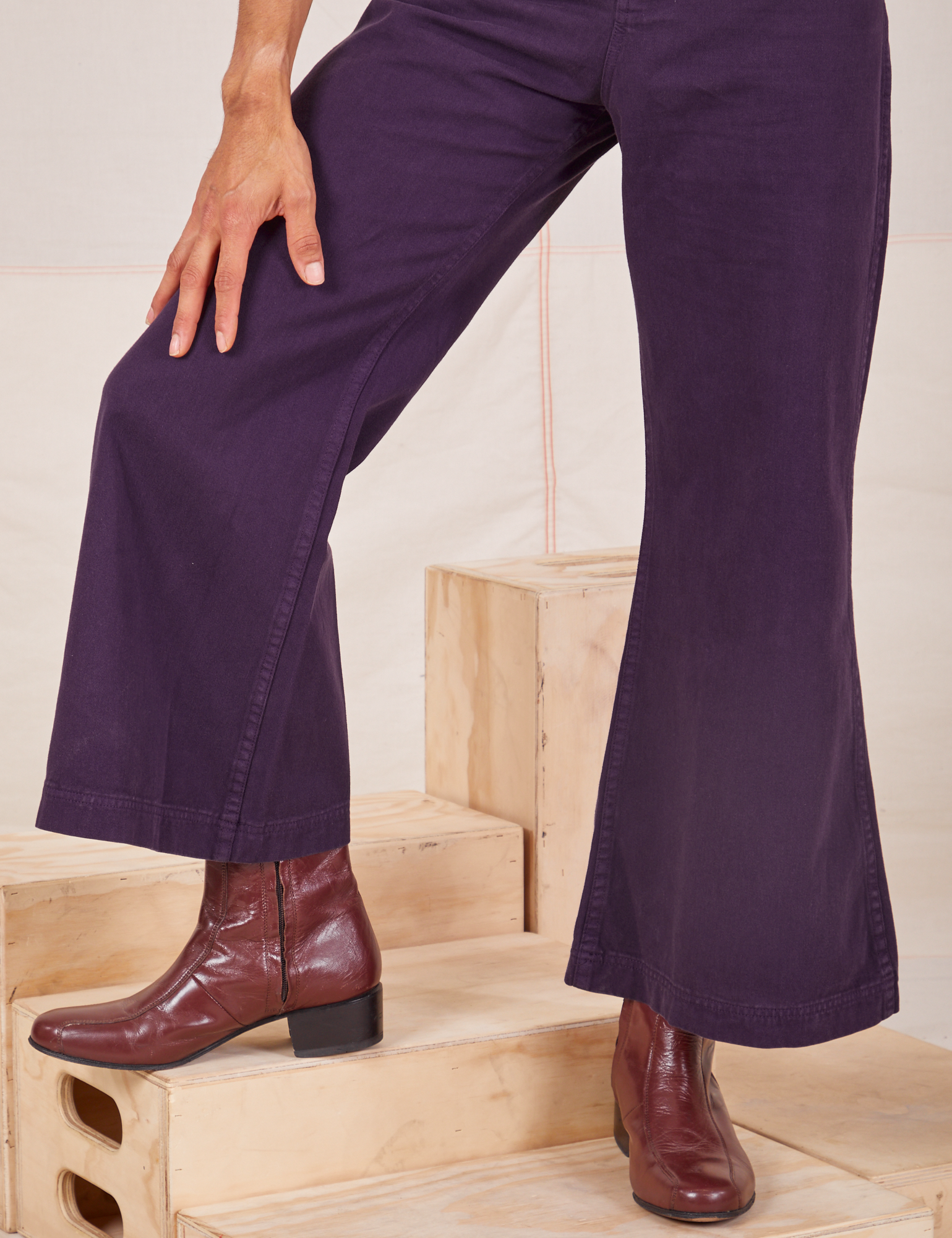 Close up of Bell Bottoms in Nebula Purple worn by Jesse