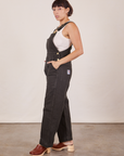 Side view of Original Overalls in Mono Espresso and vintage off-white Cropped Tank Top worn by Tiara