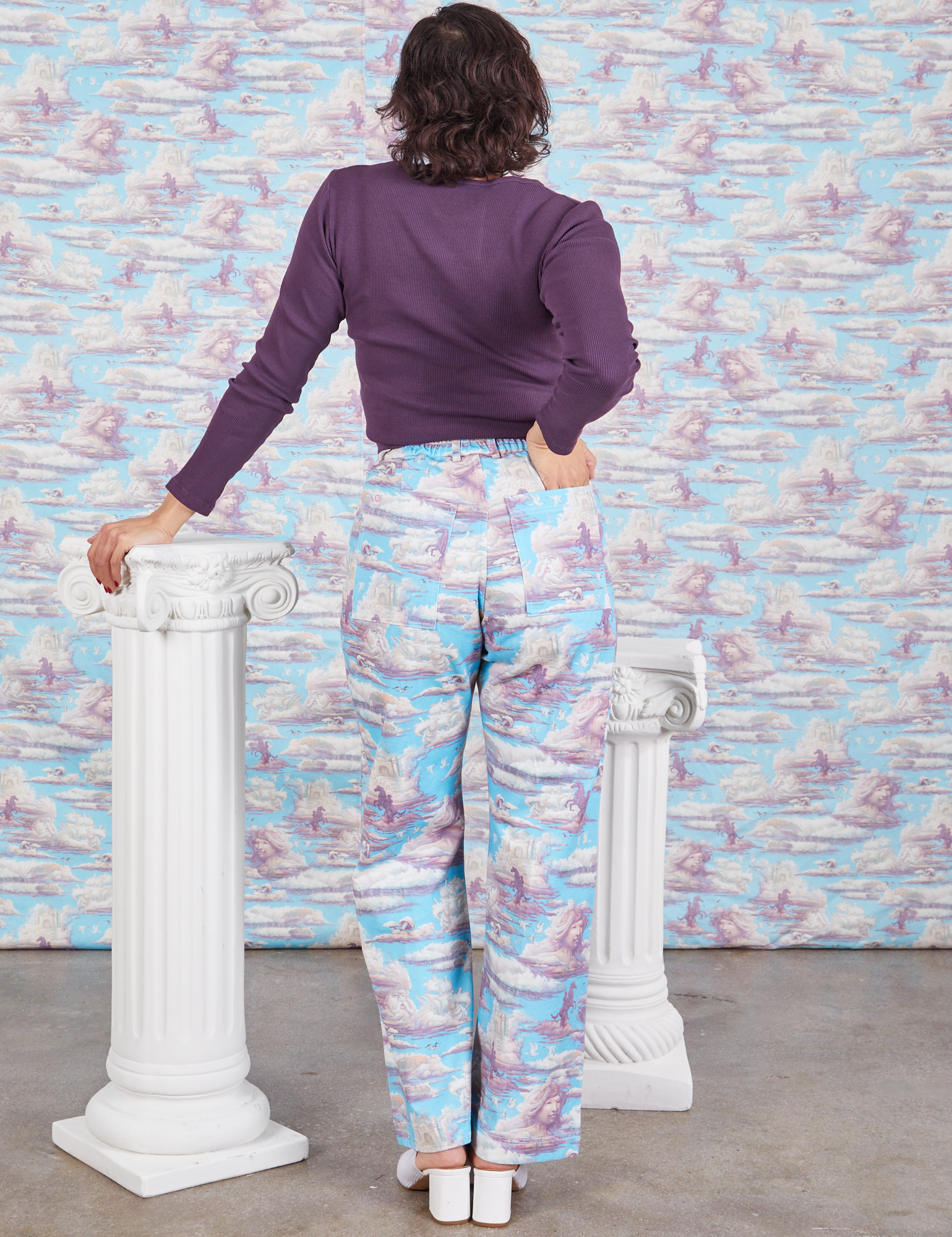 Back view of Western Pants in Cloud Kingdom and nebula Long Sleeve V-Neck Tee
