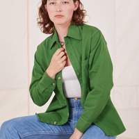 Alex is wearing size P Oversize Overshirt in Lawn Green