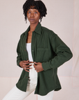 Angled front view of Twill Overshirt in Swamp Green on Cheyann