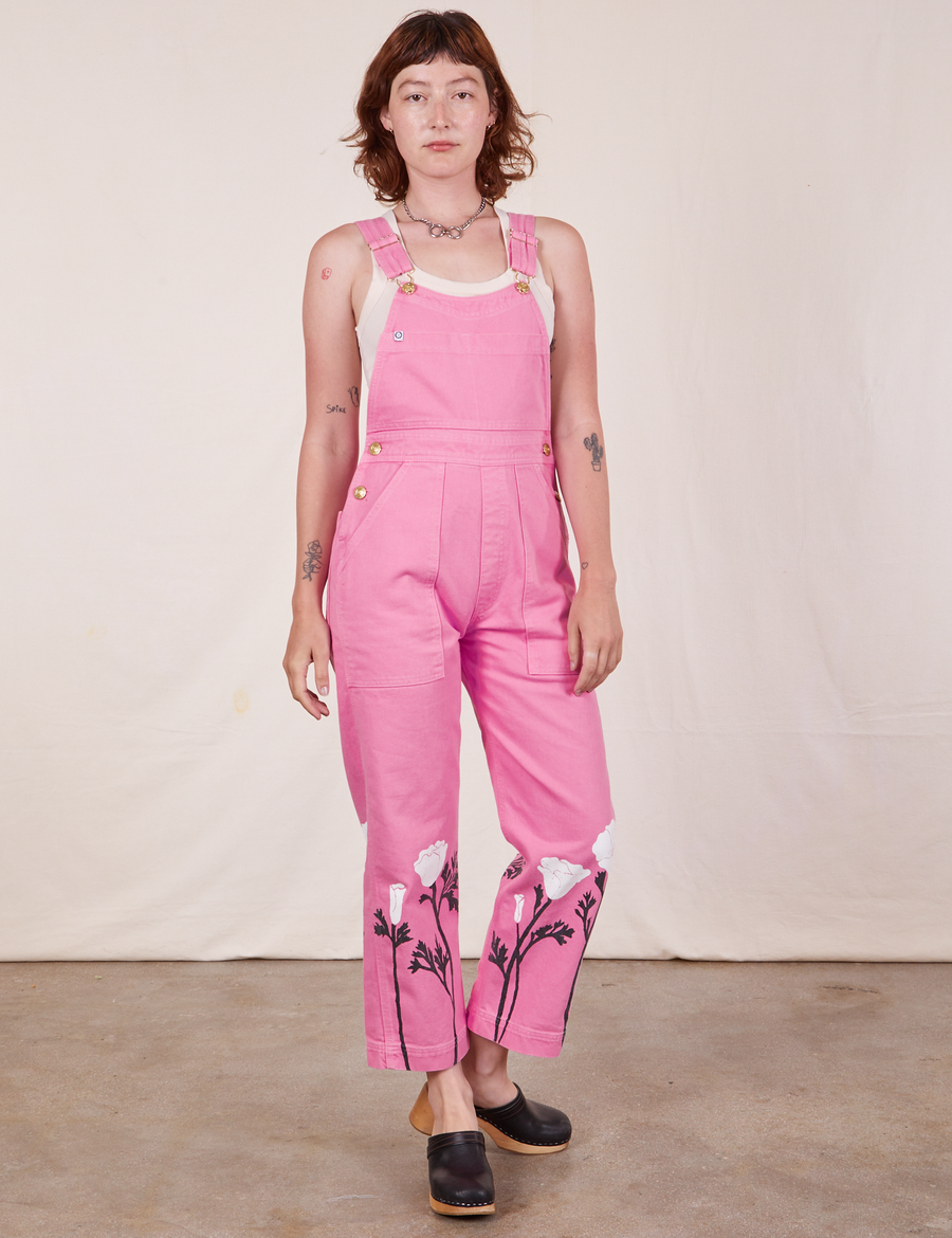 Alex is wearing California Poppy Overalls in Bubblegum Pink and vintage off-white Tank Top