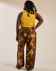 Back view of Magic Waters Drop Pocket Pants in Honey Brown and mustard yellow Cropped Tank on Demi