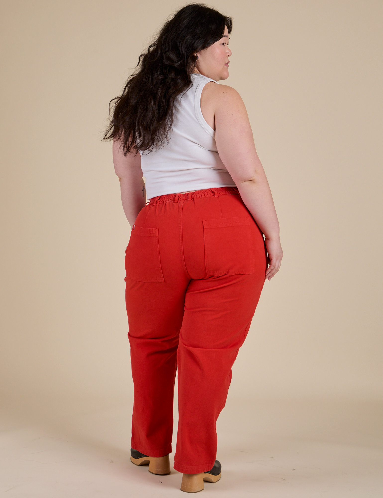 Back view of Work Pants in Mustang Red on Ashley