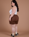 Angled back view of Classic Work Shorts in Fudgesicle Brown on Ashley