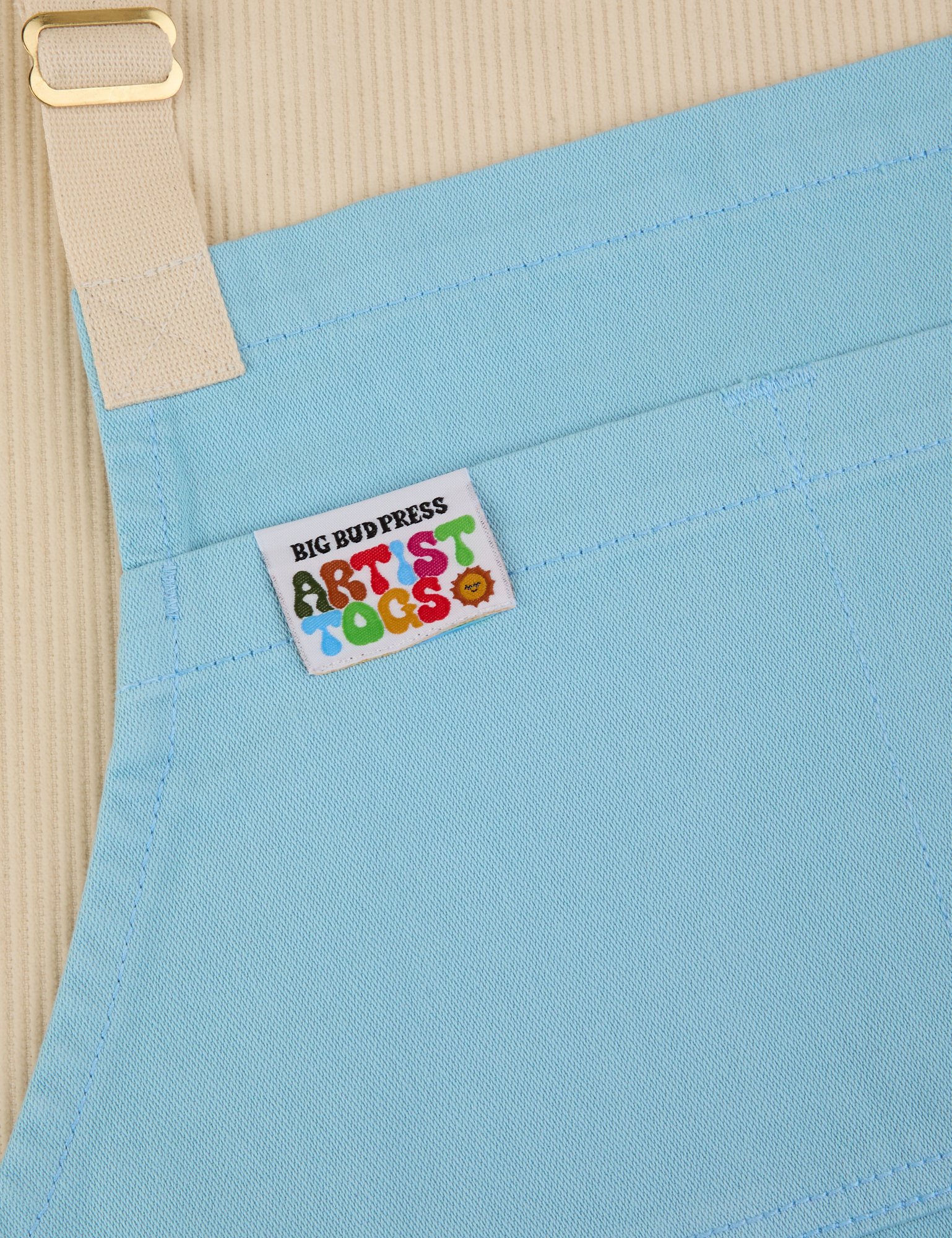 Full Denim Apron in Baby Blue close up