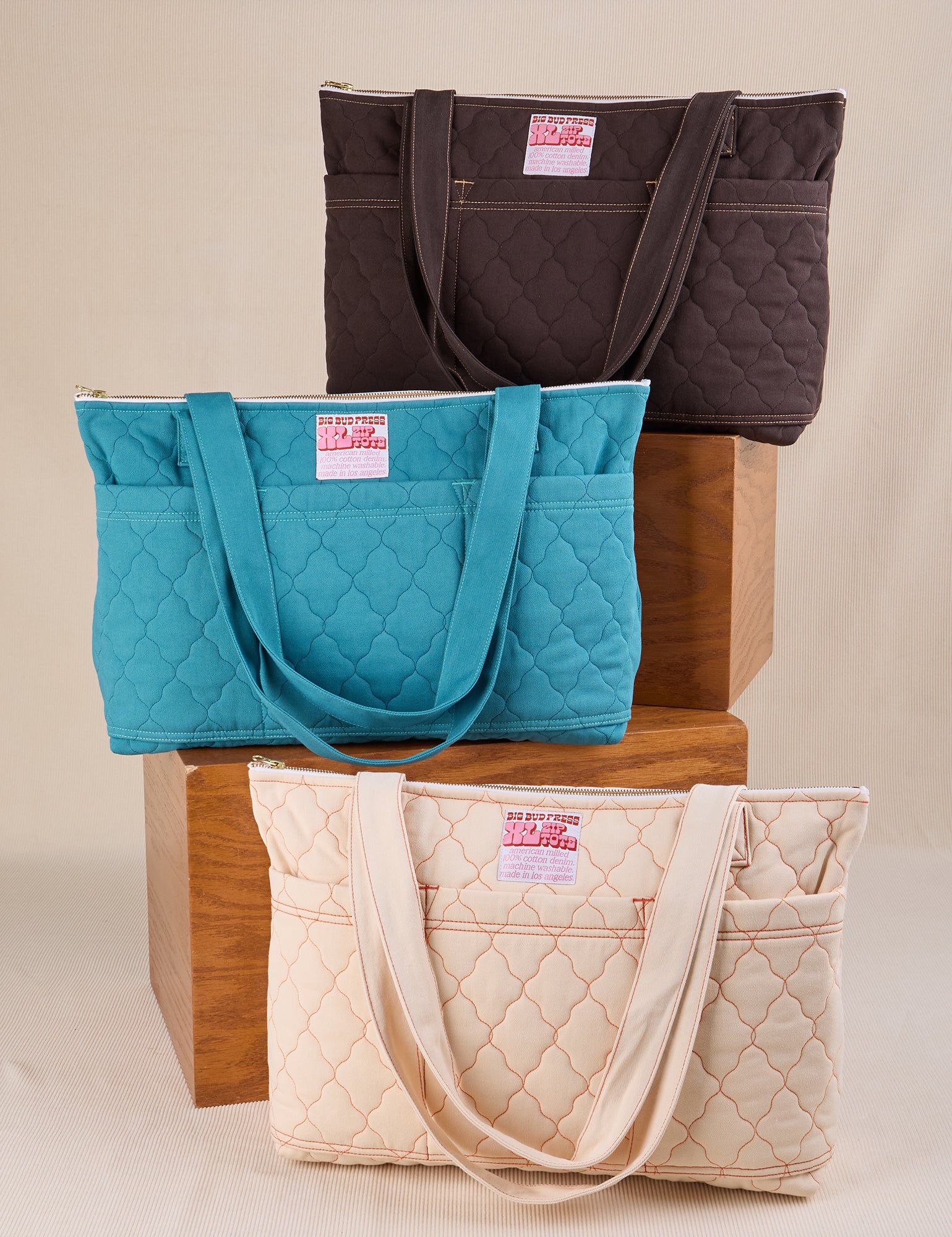 Quilted XL Tote in marine blue, espresso brown, and vintage tee off-white