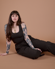 Sydney is wearing Action Pants in Espresso Brown and matching Cropped Tank
