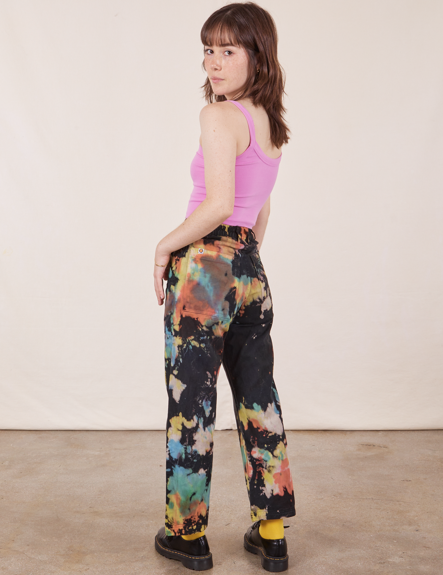 Angled back view of Rainbow Magic Waters Work Pants worn by Hana