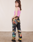 Angled back view of Rainbow Magic Waters Work Pants worn by Hana