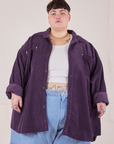 Jordan is 5'4" and wearing 4XL Corduroy Overshirt in Nebula Purple with a vintage off-white Cropped Tank Top underneath paired with a light wash Denim Trouser Jeans