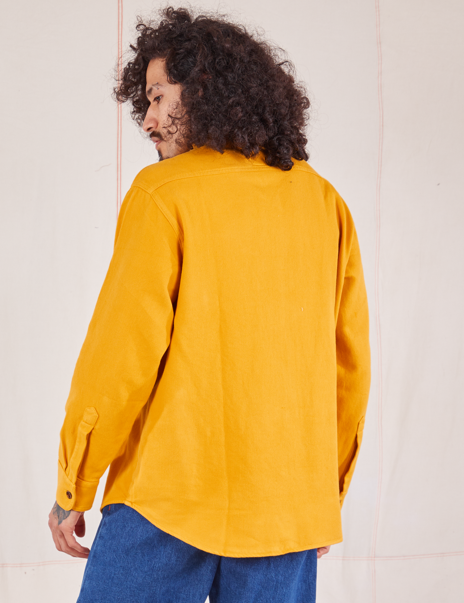 Back view of Flannel Overshirt in Mustard Yellow on Jesse