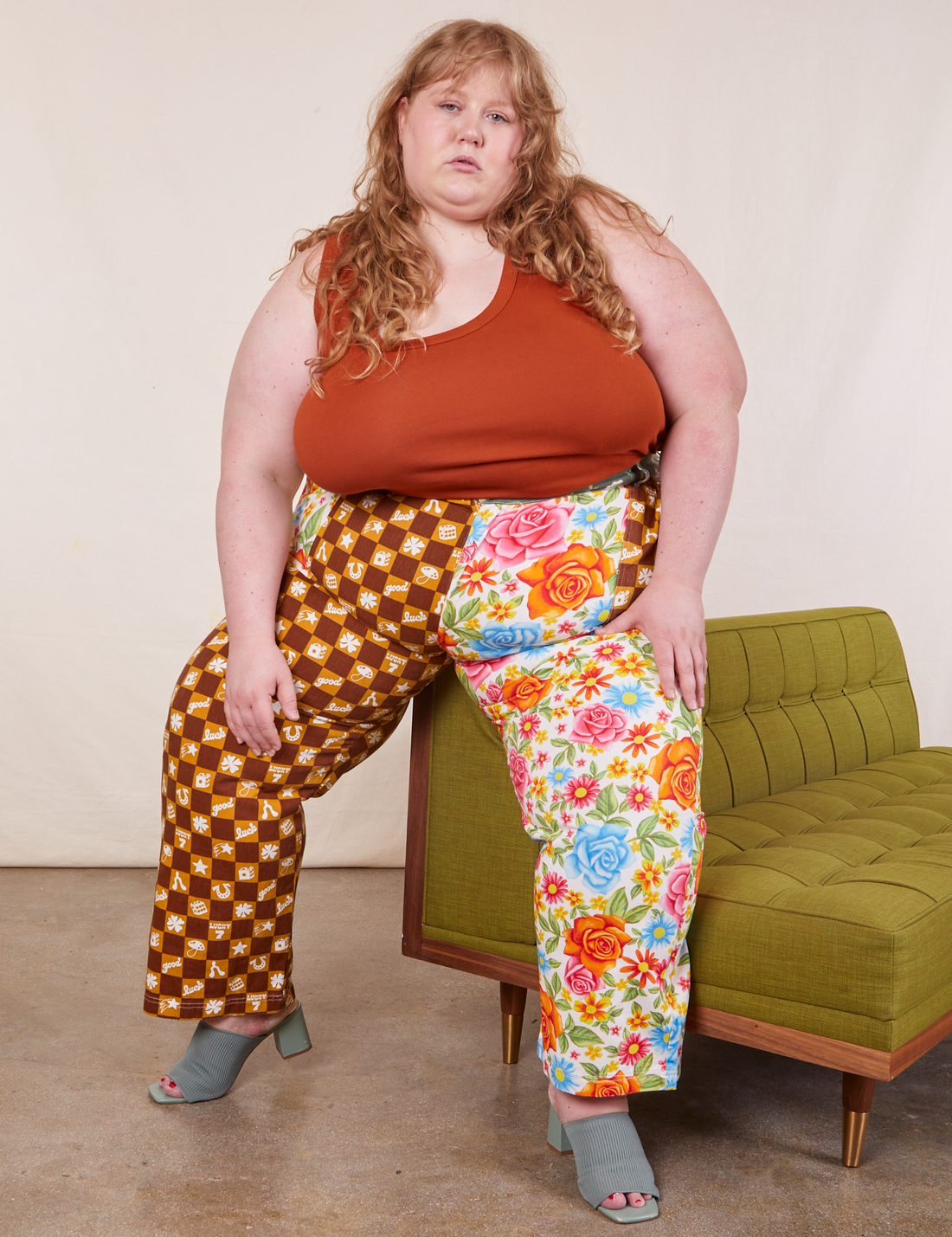 Catie is wearing Mismatched Print Work Pants and burnt terracotta Tank Top