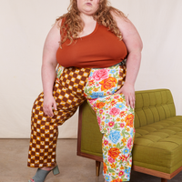 Catie is wearing Mismatched Print Work Pants and burnt terracotta Tank Top