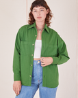 Alex is wearing Oversize Overshirt in Lawn Green with a vintage off-white Cropped Tank Top underneath