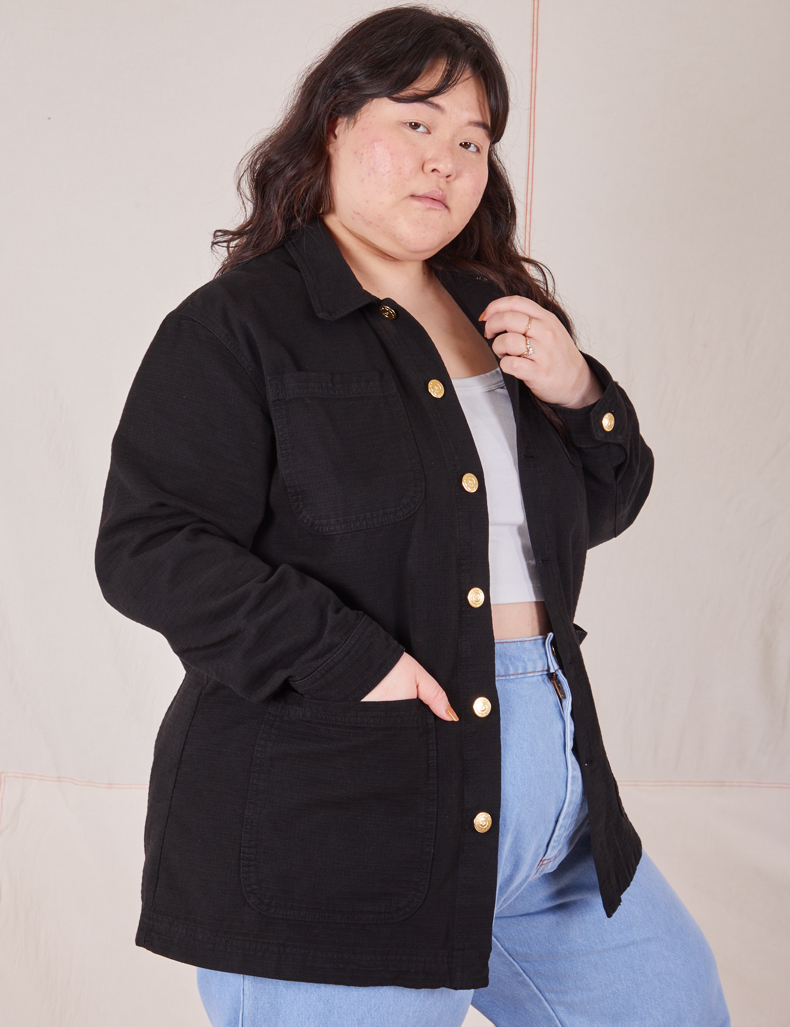 Field Coat in Basic Black angled front view on Ashley