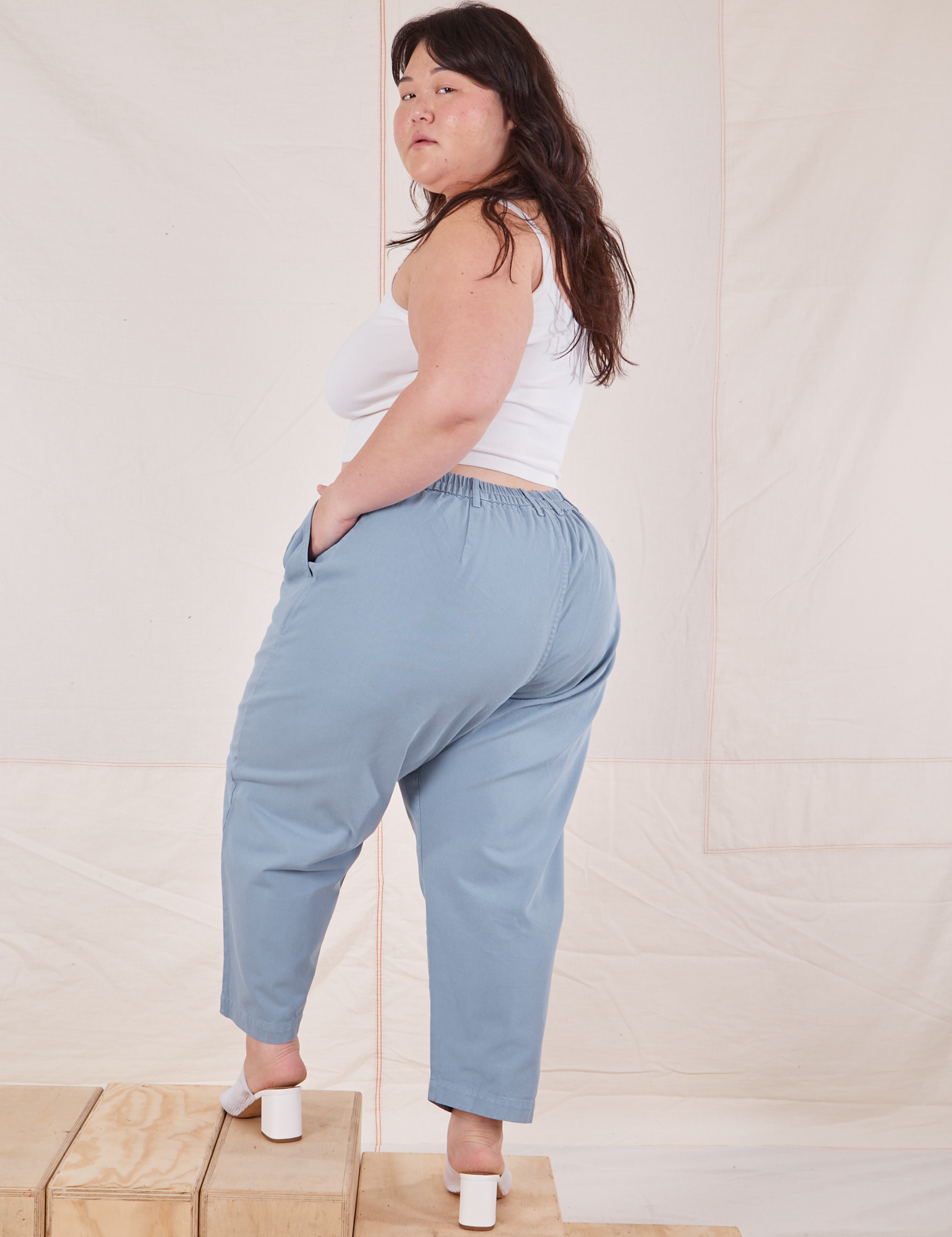 Angled back view of Heavyweight Trousers in Periwinkle on Ashley