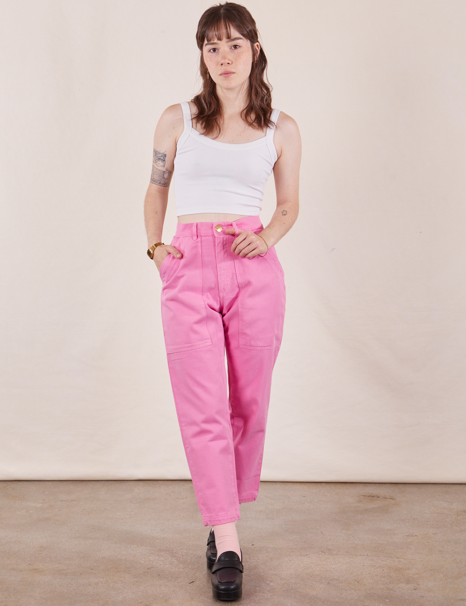 Hana is 5&#39;3&quot; and wearing XXS Petite Pencil Pants in Bubblegum Pink paired with vintage off-white Cropped Cami
