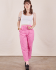 Hana is 5'3" and wearing XXS Petite Pencil Pants in Bubblegum Pink paired with vintage off-white Cropped Cami