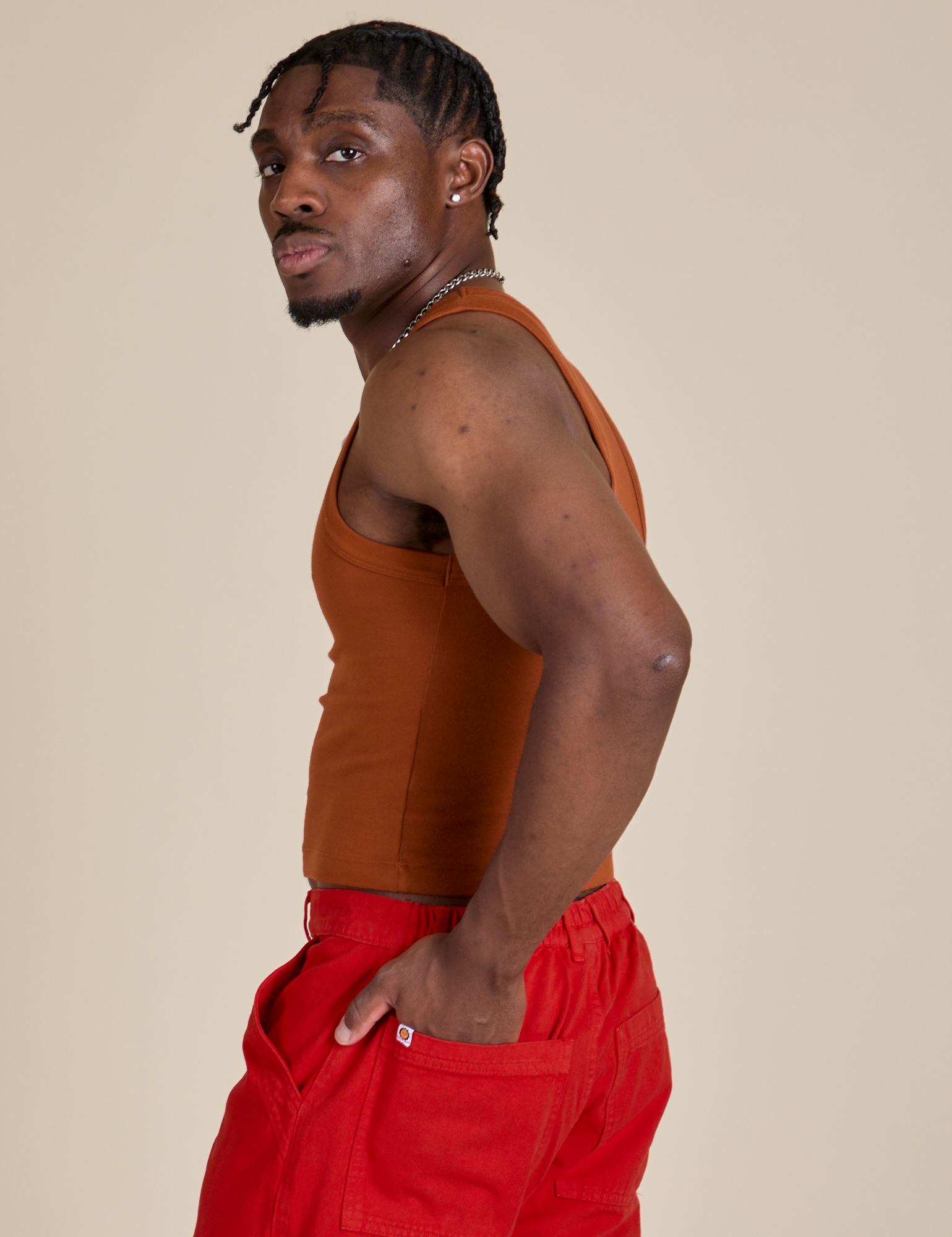 Racerback Tank in Burnt Terracotta side view on Isaac