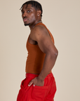 Racerback Tank in Burnt Terracotta side view on Isaac