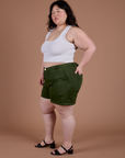Side view of Classic Work Shorts in Evergreen and Cropped Tank in Vintage Tee White on Ashley