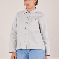 Tiara is wearing a buttoned up Denim Work Jacket in Dishwater White