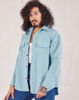 Angled front view of Flannel Overshirt in Baby Blue on Jesse