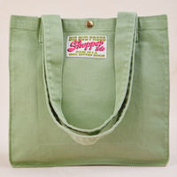 Shopper Tote Bag in Sage Green with straps hanging down front of bag